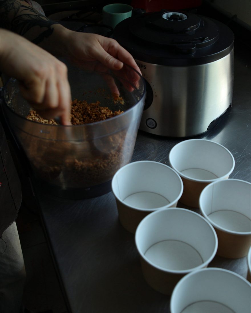Preparing granola pudding cups